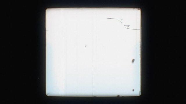 Film noise and grain dynamic flickering texture. Black square frame or vignette. Dust, dirt, scratches, hair, other artifacts. Film burn vintage effect. Analog retro clip. 8 mm strip. 4K Reel clutter 