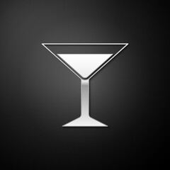 Silver Martini glass icon isolated on black background. Cocktail icon. Wine glass icon. Long shadow style. Vector.