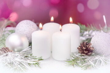 White Christmas candles. Holiday. Christmas decoration. Fir branches and candles.