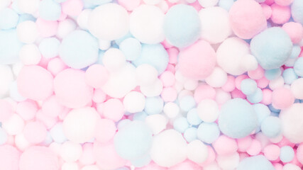 White, pink and blue soft pompons.