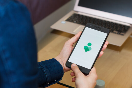 SAN FRANCISCO, US - 22 April 2019: Close up to female hands holding smartphone using Google Digital Wellbeing application, San Francisco, California, USA. An illustrative editorial image