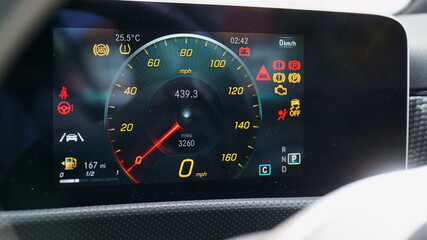 All warning lights are illuminated on the digital driver's display screen on a modern car