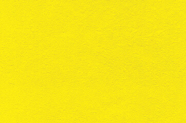 Colors of the year 2021 Illuminating yellow. background, texture of fabric, decorative plaster. trendy beauty, fashion, design concept. copy space, place for text