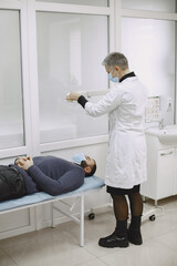 Healthcare and medical concept. Doctor with patient in hospital.