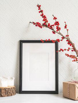 Style Christmas decor and black blank frame.