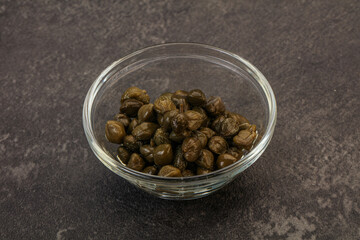 Tasty capers in the bowl
