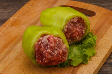 Raw stuffed bell pepper with meat