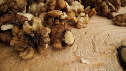 Heap of raw walnuts close-up as background. Walnuts close-up.Walnuts as background.