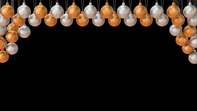 Gold and silver Christmas balls isolated on black background. 