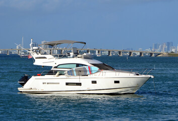 Fototapeta na wymiar White motor yacht anchored in Biscayne Bay off Miami Beach,Florida.