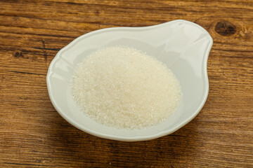 White sugar in the bowl