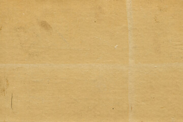 Vintage and old looking paper background. Retro cardboard texture. Grunge paper for drawing. Ancient book page.