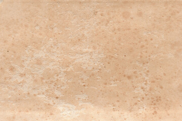 Vintage and old looking paper background. Retro cardboard texture. Grunge paper for drawing. Ancient book page.