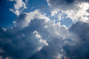 Naklejka na ściany i meble Dramatic cloudscape. Sky background with gray clouds