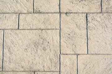 wall of rectangular stone bricks. background and texture of cobblestones. 