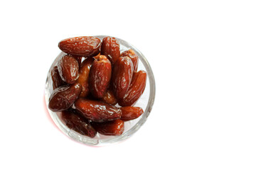 Dried dates isolated on white background. Symbolizing Ramadan after fasting