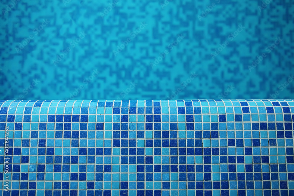 Wall mural background of modern swimming pool with blue tile in hotel spa center.