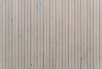 abstract background of an old painted wooden fence close up