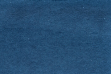 Vintage and old looking paper background. Retro cardboard texture. Grunge paper for drawing. Ancient book page.