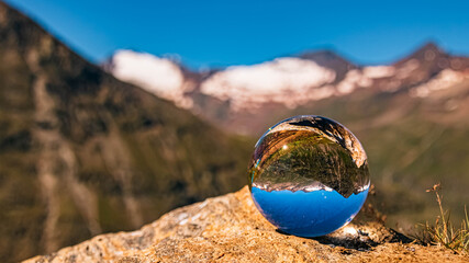 Crystal ball alpine landscape shot at the famous Hohe Mut summit, Obergurgl, Oetztal, Tyrol, Austria