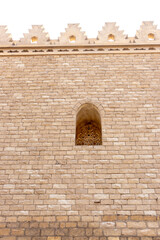 minaret of public historic Al Hakim Mosque known as the enlightened mosque located in Moez street, old Cairo, Egypt