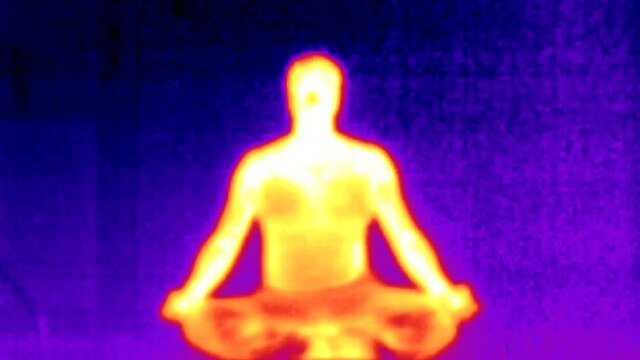 man Meditate yoga in Energy concept. Thermal imaging camera detecting body heat. temperature termo vision