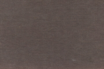 Vintage and old looking paper background. Retro cardboard texture. Grunge paper for drawing. Ancient book page.