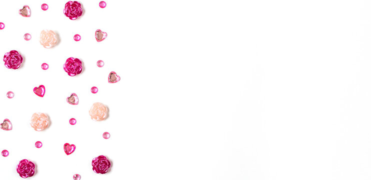 Greeting card for Valentine's Day. hearts, roses and rhinestones on white background