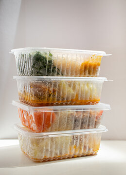 Frozen Meals Stacked In Disposable Plastic Containers