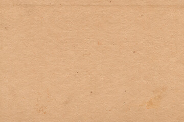 Vintage and old looking paper background. Retro cardboard texture. Grunge paper for drawing. Ancient book page.