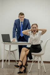 Angry boss yelling at his young employee, she is stressed and feeling frustrated: hostile boss and...