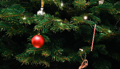 Christmas toys on the Christmas tree , close up. Holidays concept. Merry Christmas