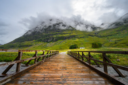Wooden bridge over Loch Achtriochtan in Glen Coe
