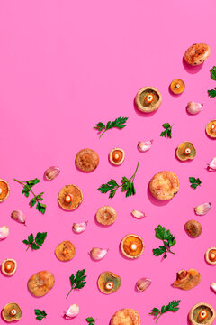 Pattern of mushroom, parsley and garlic assorted on pink background