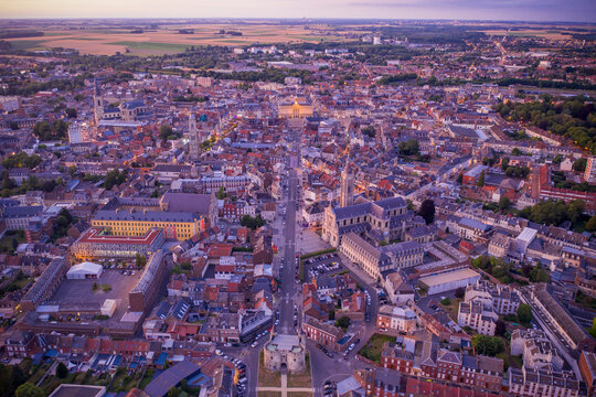 France, Nord, Cambrai, Aerial view of city at dusk