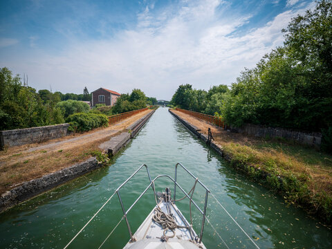 France, Aisne, Bow of boat sailing along Canal De L'Oise A L'Aisne