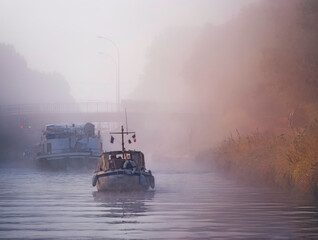Boats on Canal entre Champagne et Bourgogne during foggy weather