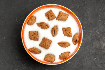 top view pillow cookies with milk for breakfast on dark background sweet biscuit milk kid