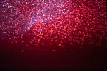 red glitter and bokeh background