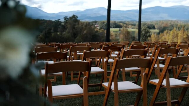 Flowers Reveal Empty Seating Chairs Wedding Venue Ceremony