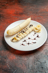 front view delicious banana with sliced pieces inside plate on dark background sweet photo tree fruit color