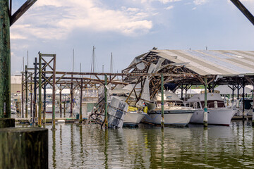 Waterspout damage at marina to yachts, boats and sailboats