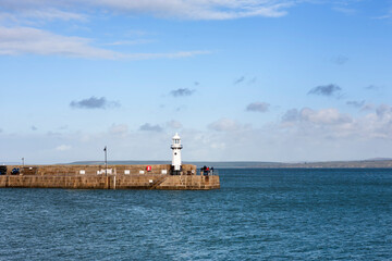 St. Ives' harbour and Smeaton's Pier at high tide from Wharf Road, St Ives, Cornwall, England, UK