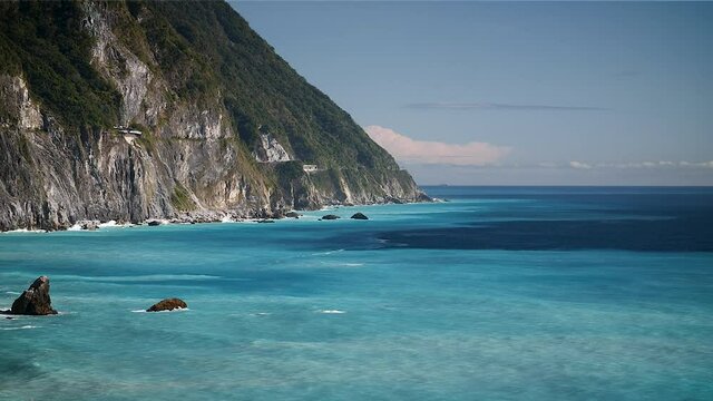 Turquoise water sea cliff coastline in Taroko Gorge National Park, Taipei, Taiwan. Mid angle, static movement, slow motion, HD.