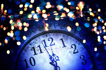 Fototapeta na wymiar new year background clock and fireworks