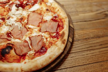 Pizza on wooden table top view. Fast food. Post blog social media. with copy space. Pizza ready to eat