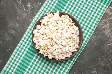 top view fresh popcorn on dark background darkness cinema movie color corn snack
