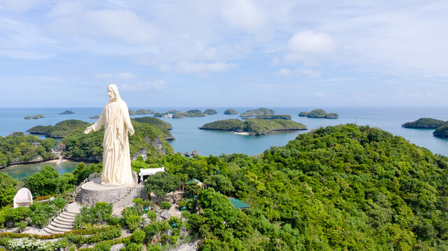 Statue of Jesus Christ on Pilgrimage island in Hundred Islands National Park, Pangasinan, Philippines.