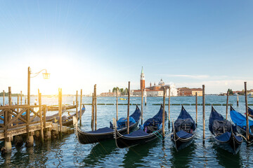 Grand canal with gondolas in travel Europe Venice city, Italy. Old italian architecture with landmark bridge, romantic boat. Venezia.