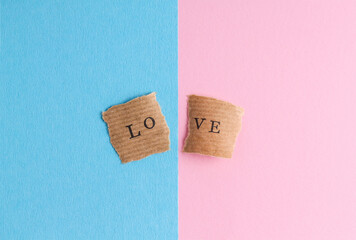 The word love on a pink and blue background. Parting.